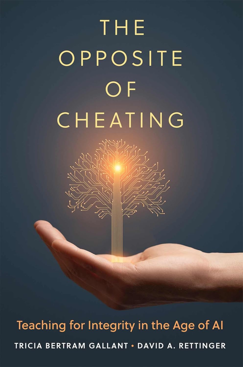 A hand holding a yellow tree with a glowing center