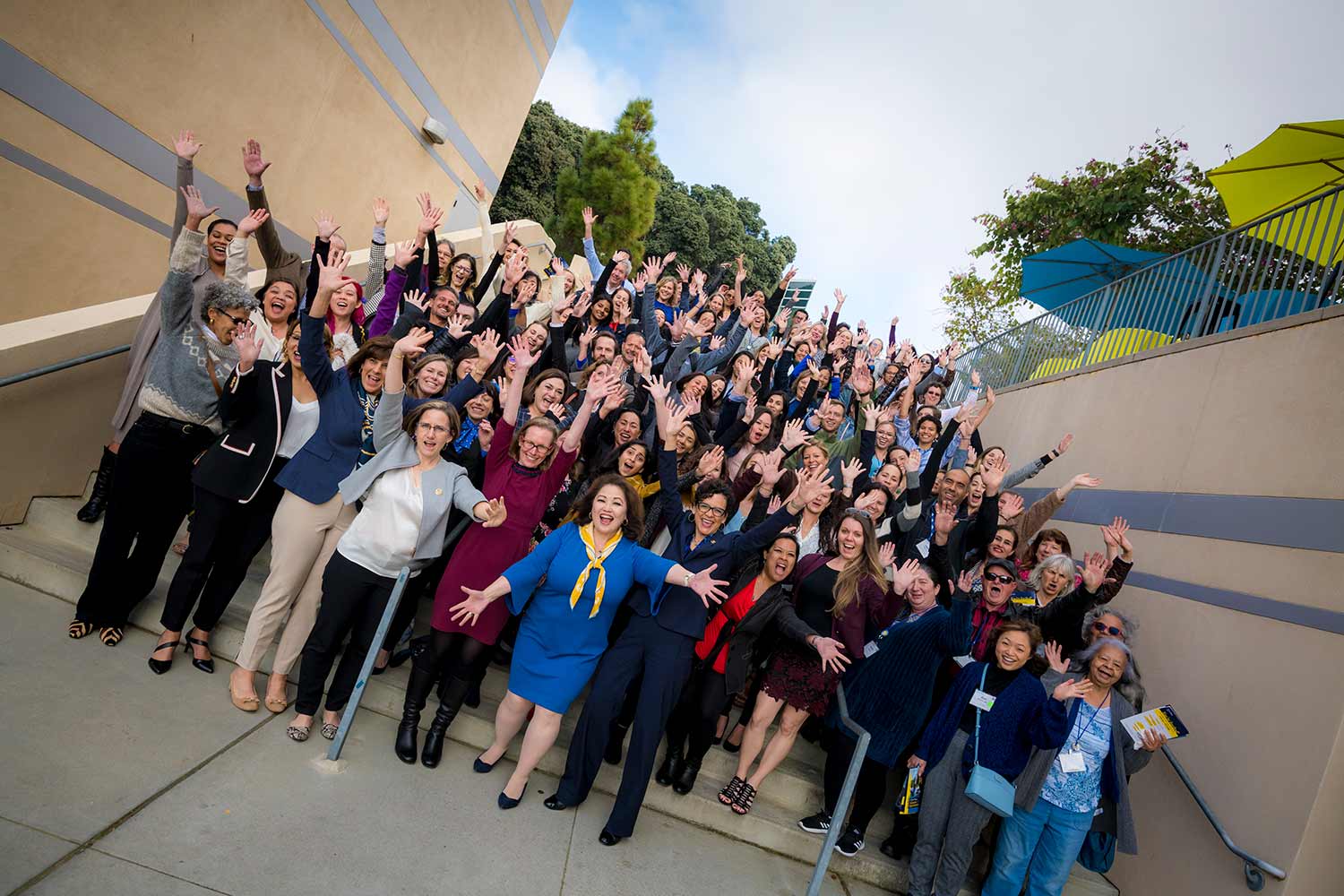 Triton Women who lead forum posing for photo.