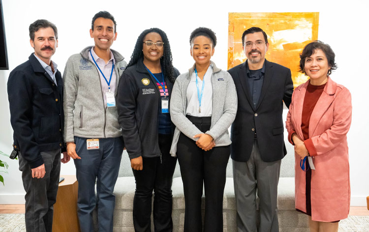 Three PRIME students pictures smiling with three PRIME faculty members