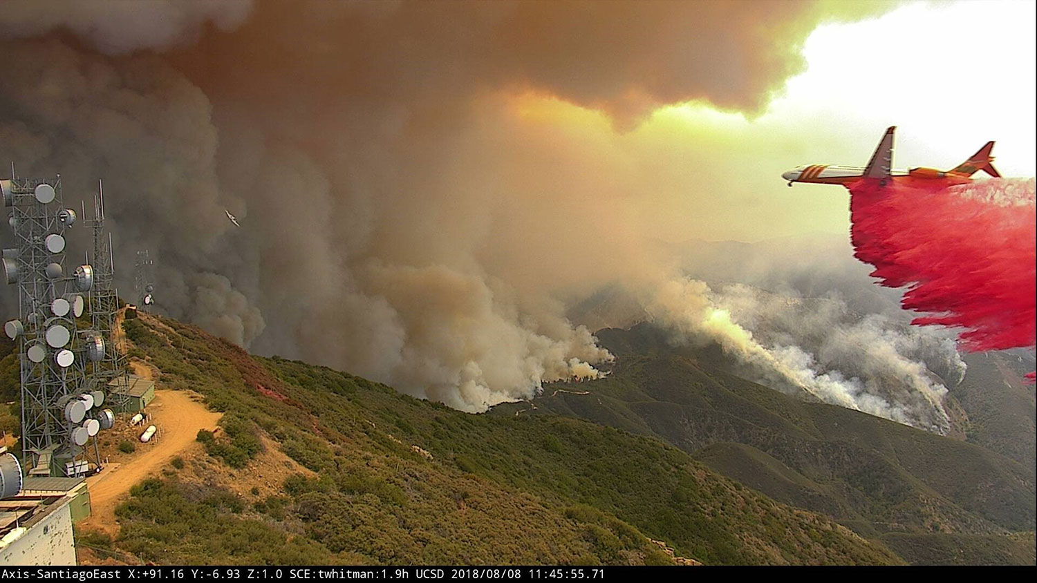 fire airplane over California mountains