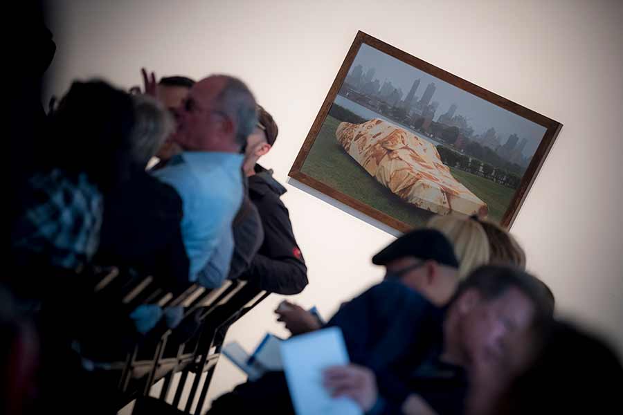 art image of car wrapped in blanket with tortilla pattern