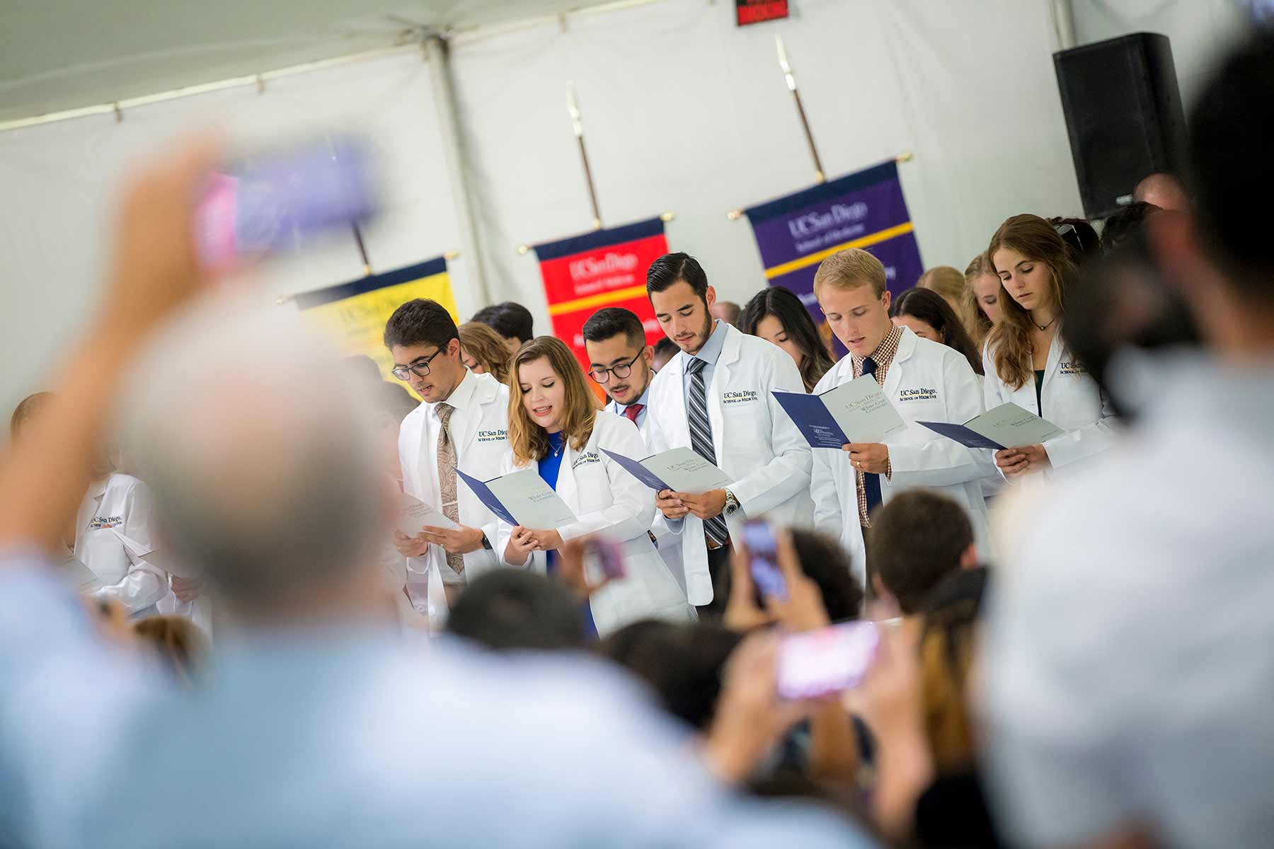 New medical students recite the Oath of Hippocrates for the first time together.
