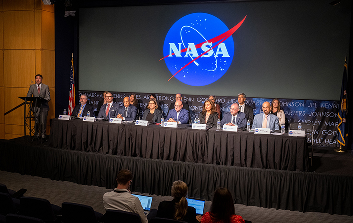 NASA UAP panelists sitting in a row at a conference