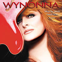 Wyonna album cover, her face next to guitar