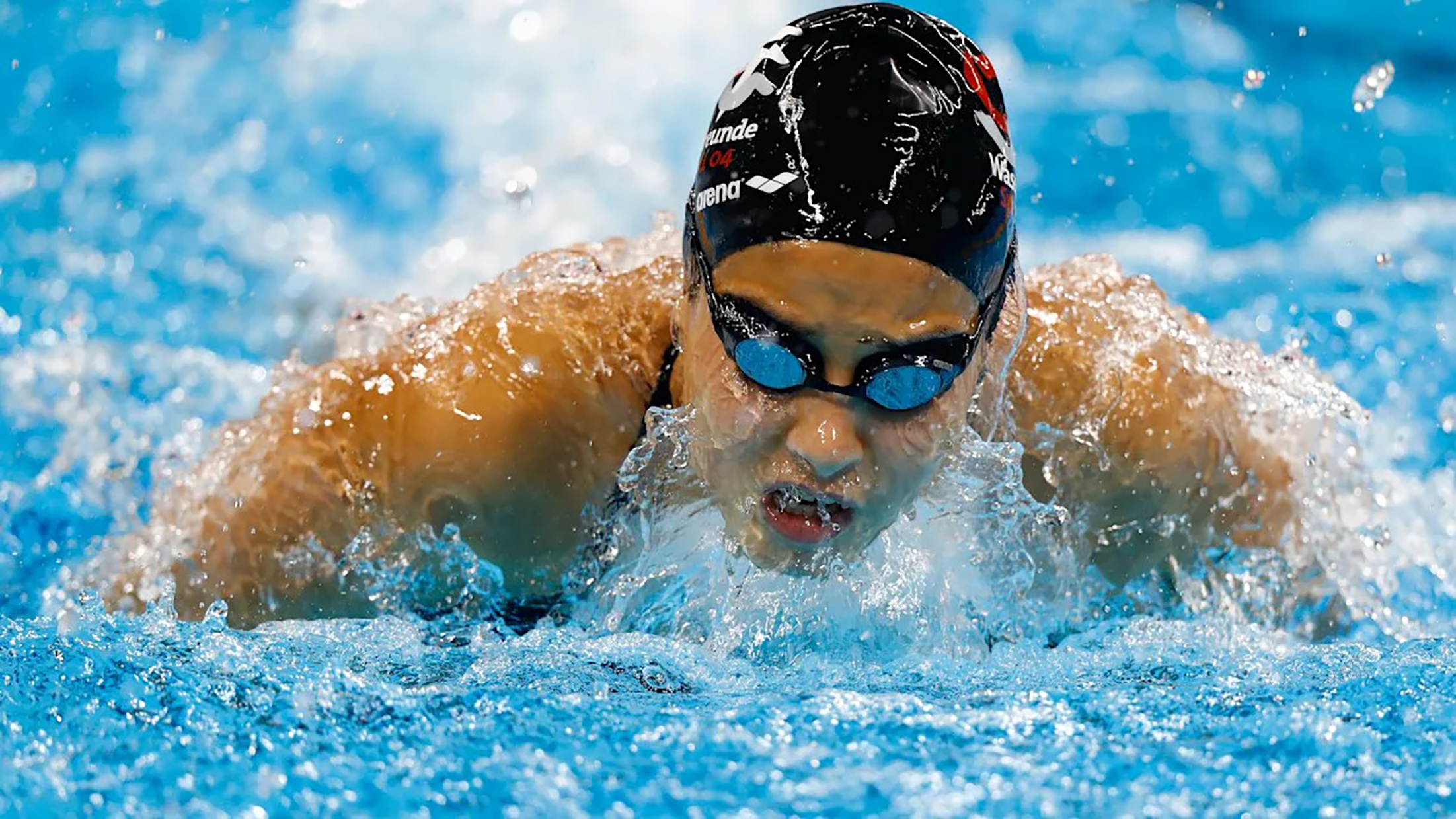 Yusra Mardini pictured swimming in a pool.
