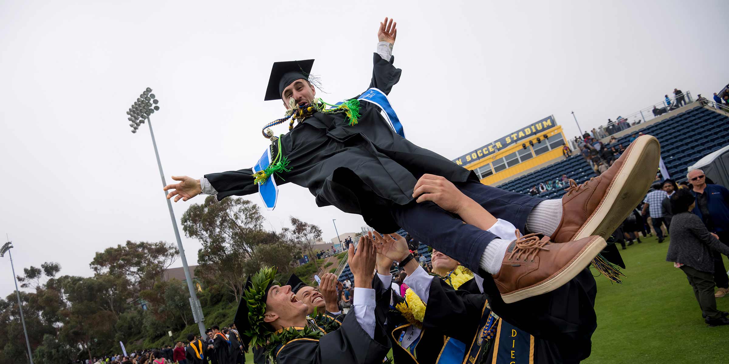 Triton Soccer athletes celebrate following the All Campus Commencement