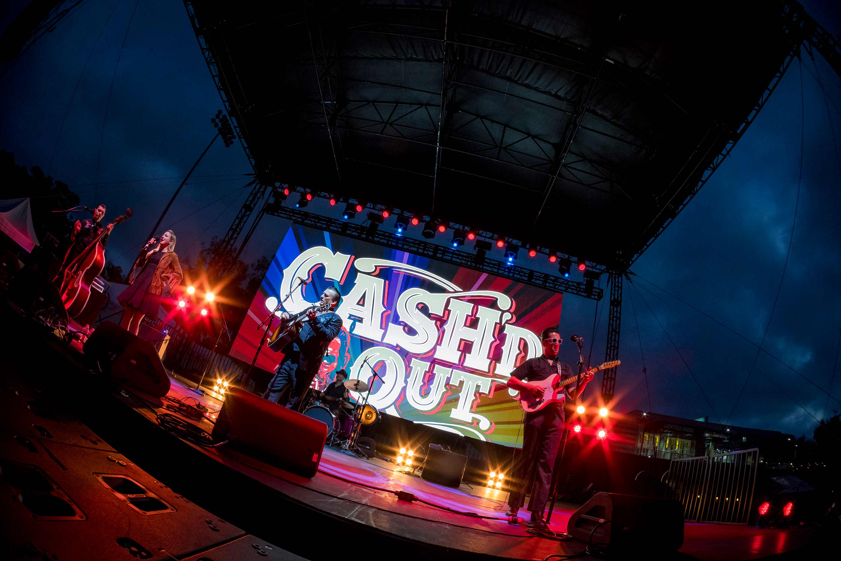 Johnny Cash cover band Cash'd Out performs at the Triton Tailgate.