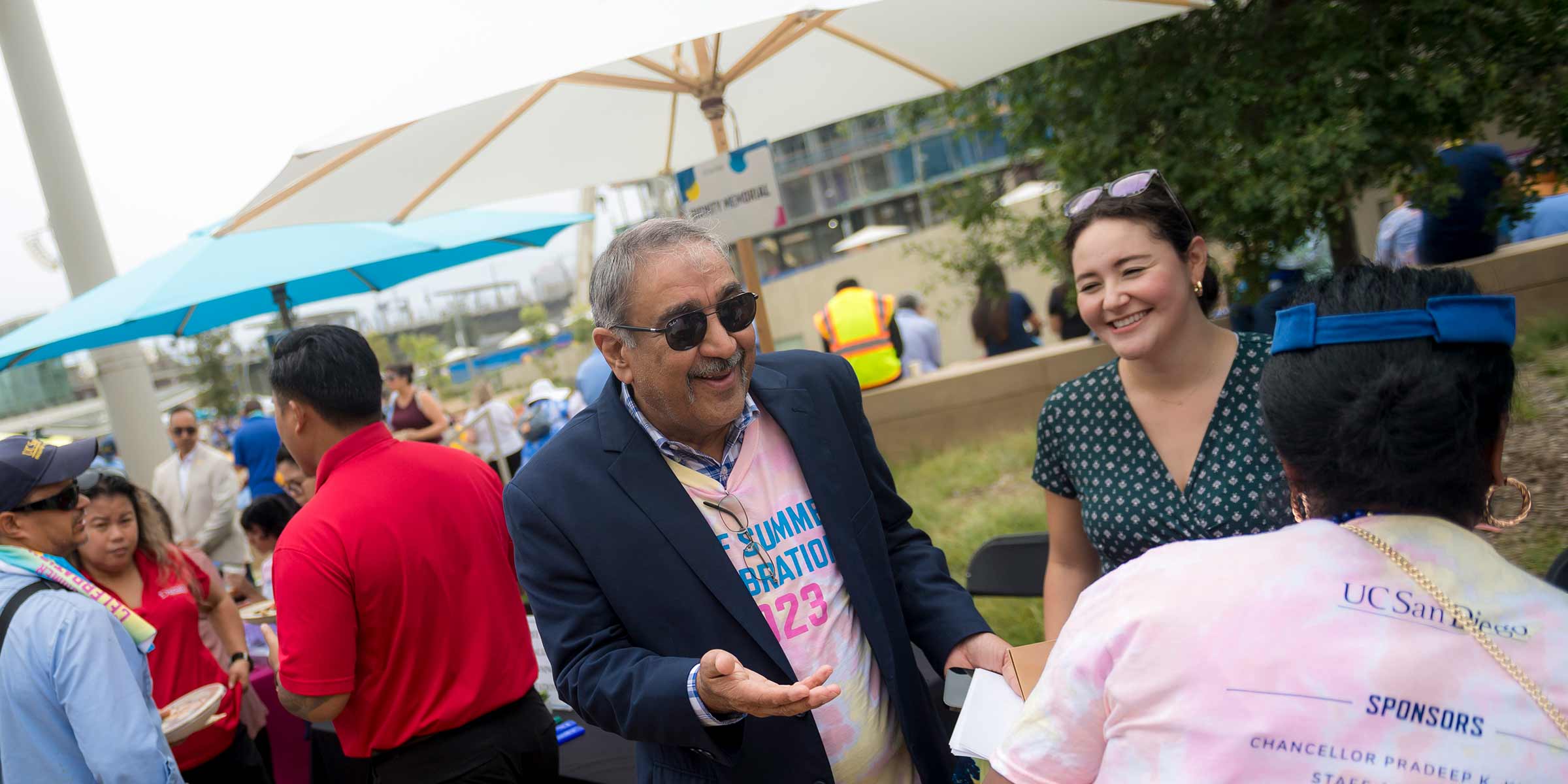 The Chancellor talks with staff at the Staff Summer Celebration