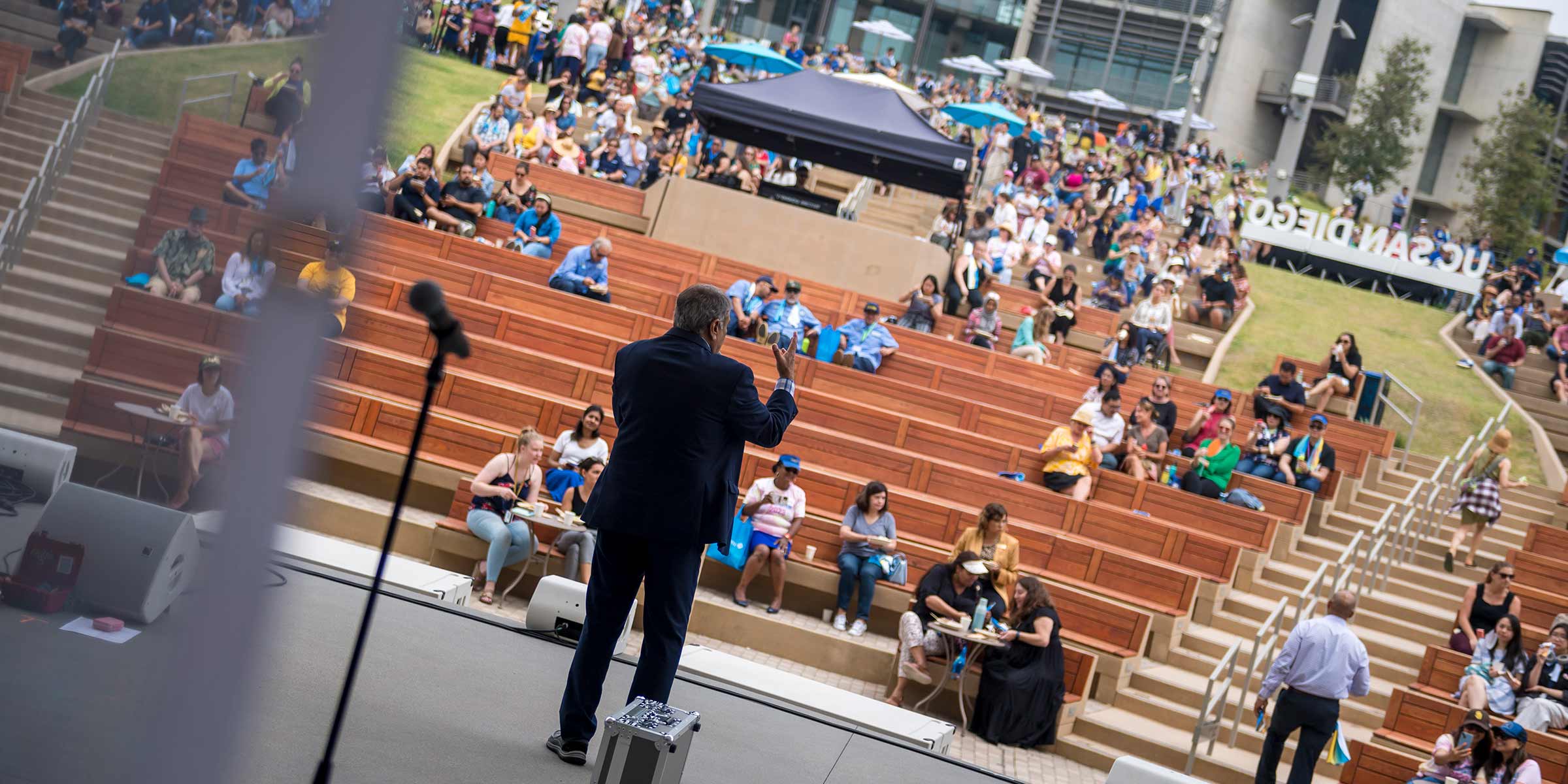 The Chancellor talks with staff at the Staff Summer Celebration