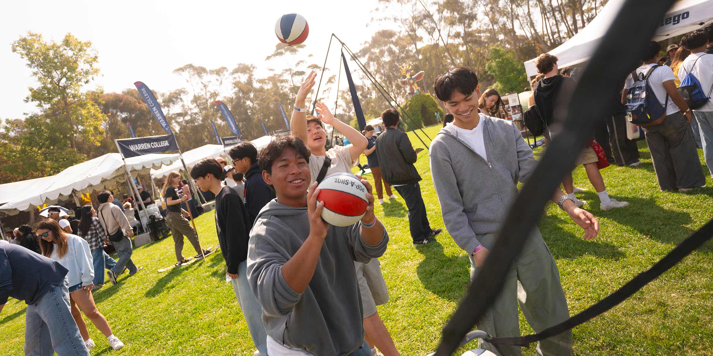Prospective students play games on Sun God Lawn