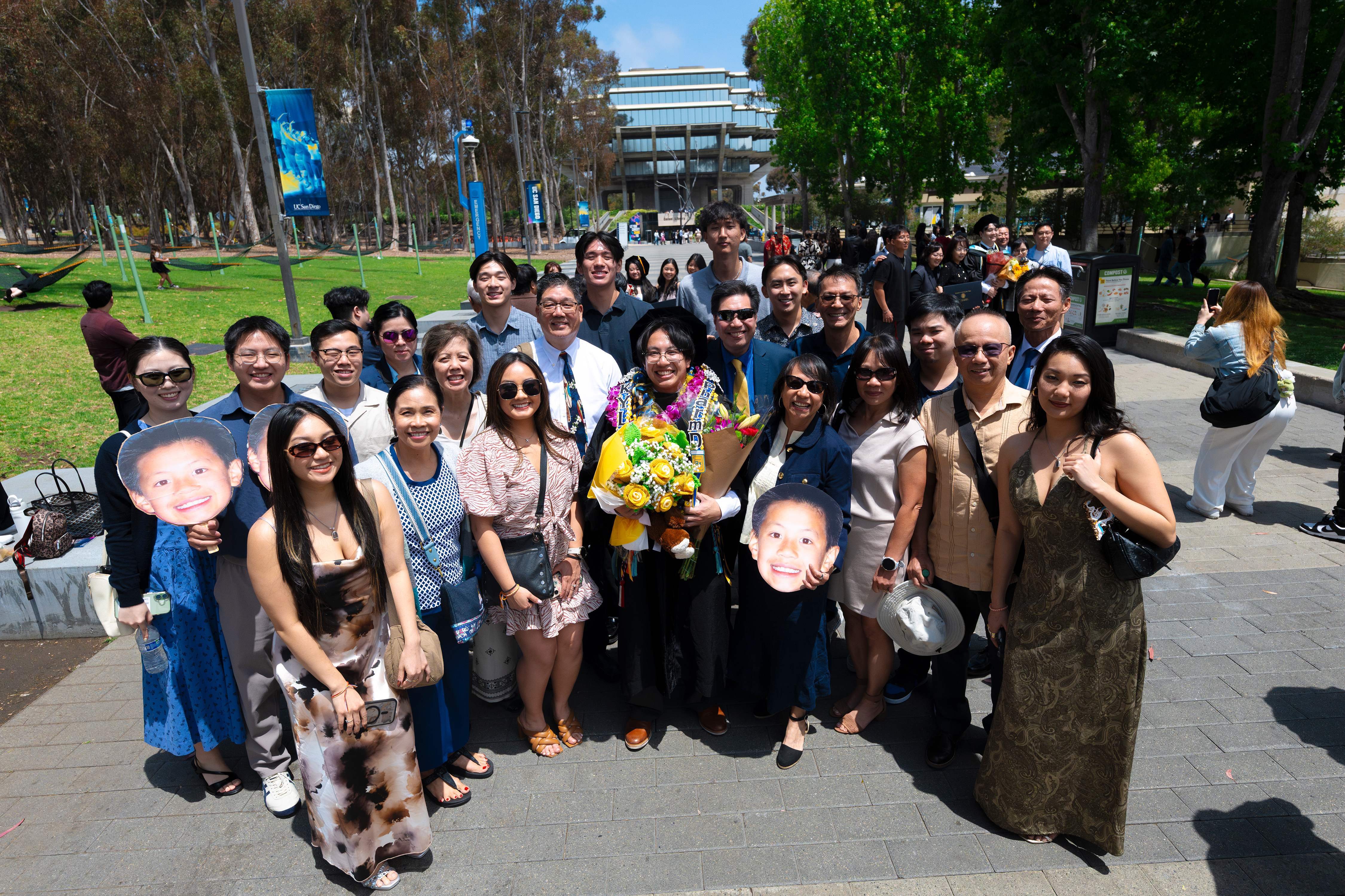 Group photo of a family celebrating graduation.