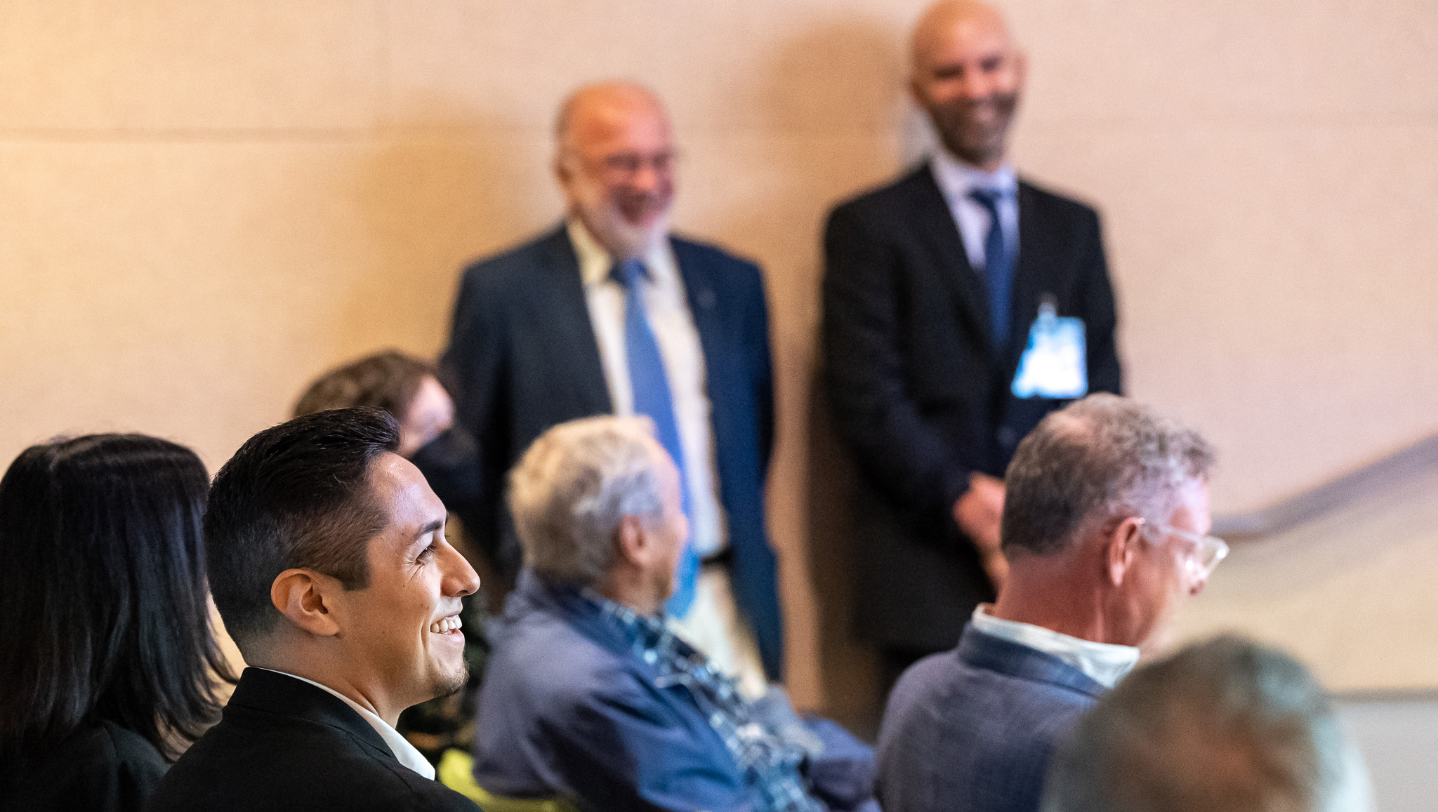 Attendees listening to speakers.