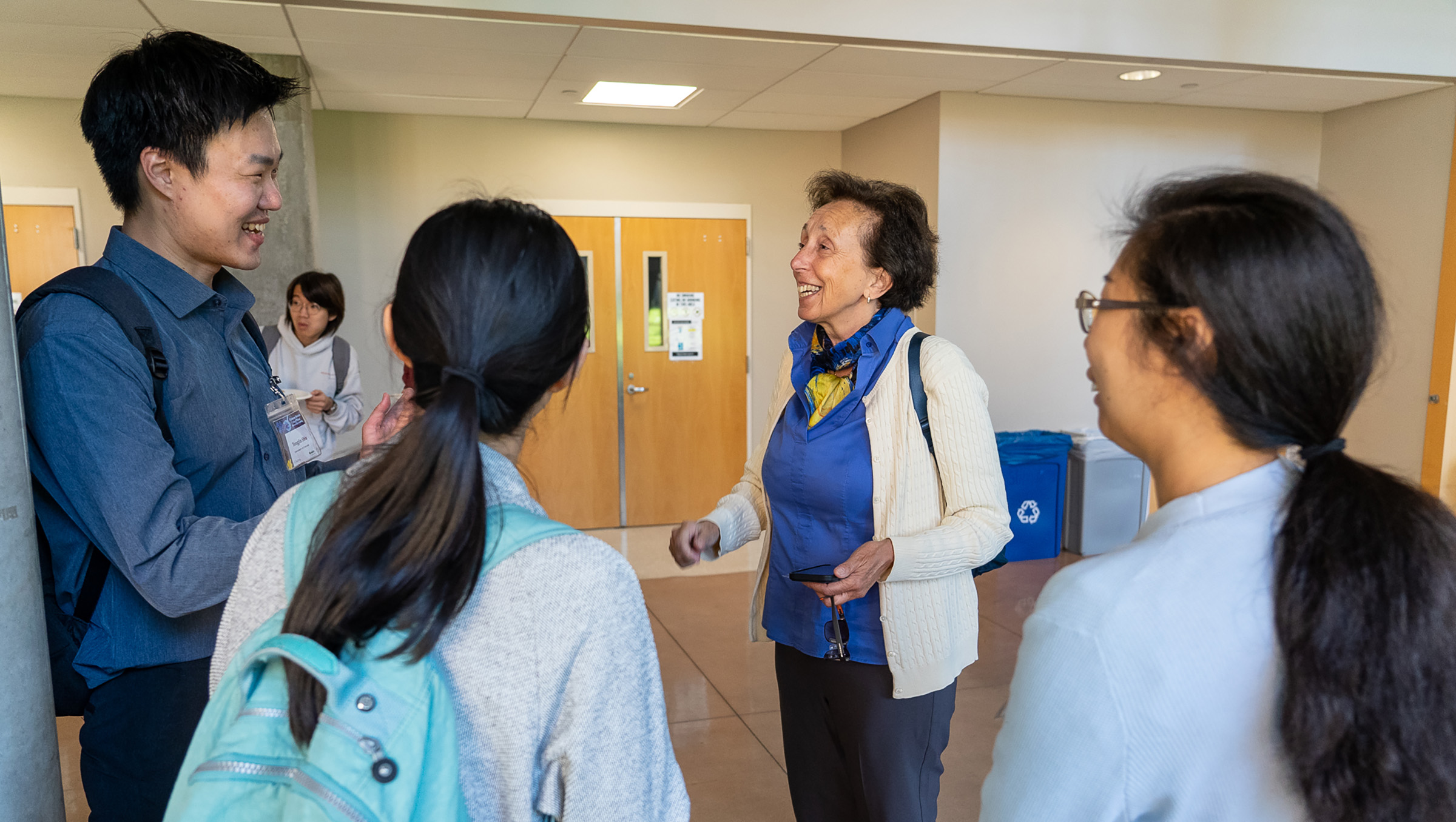 Giulia Galli talking with attendees.