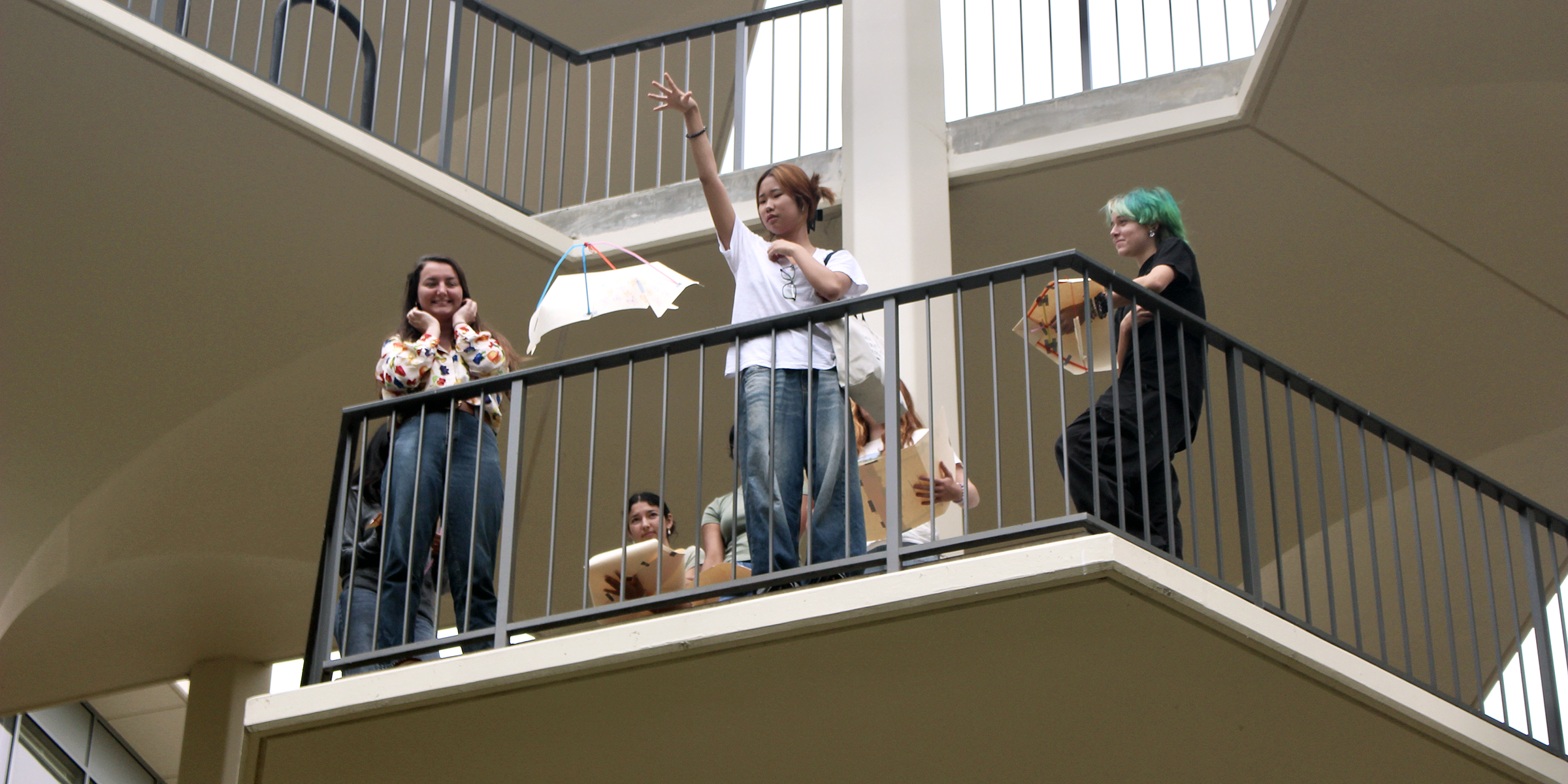 Students launch glider off a balcony