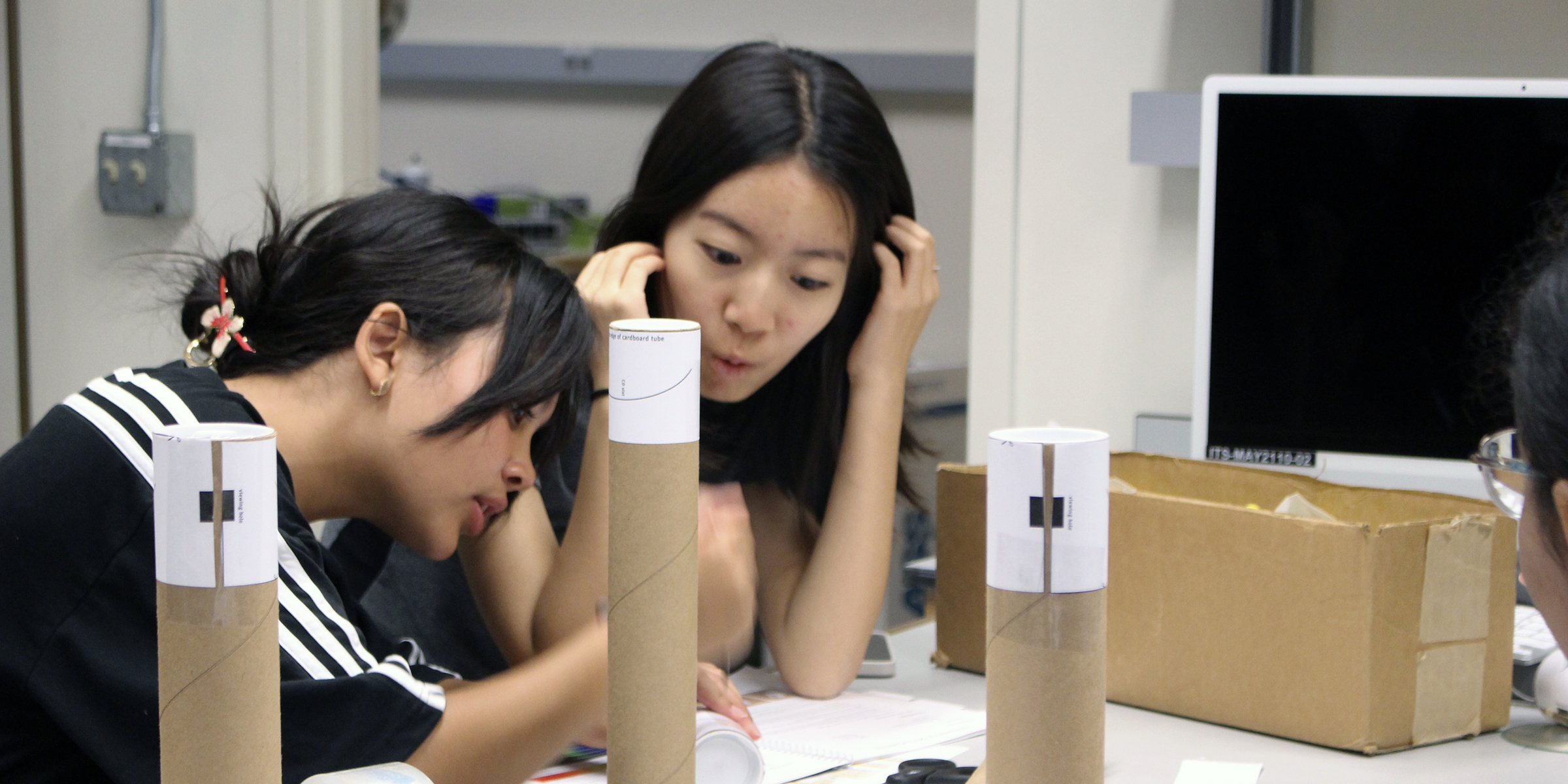 students work on a rocket launcher