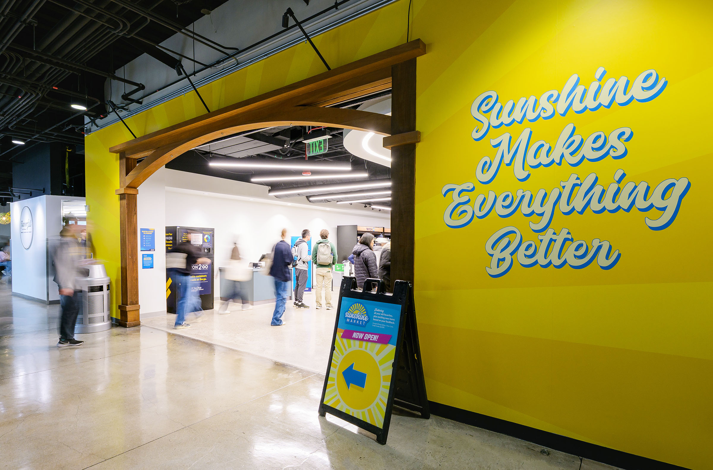 store doorway opening with patrons