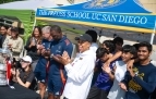 Slideshow: The Preuss School Superintendent Dr. Helen Griffith cheers alongside Preuss scholars and Manchester United legends Andy Cole and Denis Irwin.