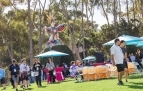 Slideshow: UC San Diego students and their families walk around Sun God Lawn during a breakfast. 