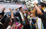 Slideshow: Students cheer as their caps are thrown in the air