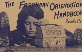 Slideshow: a person sitting with a Snoopy lunch box