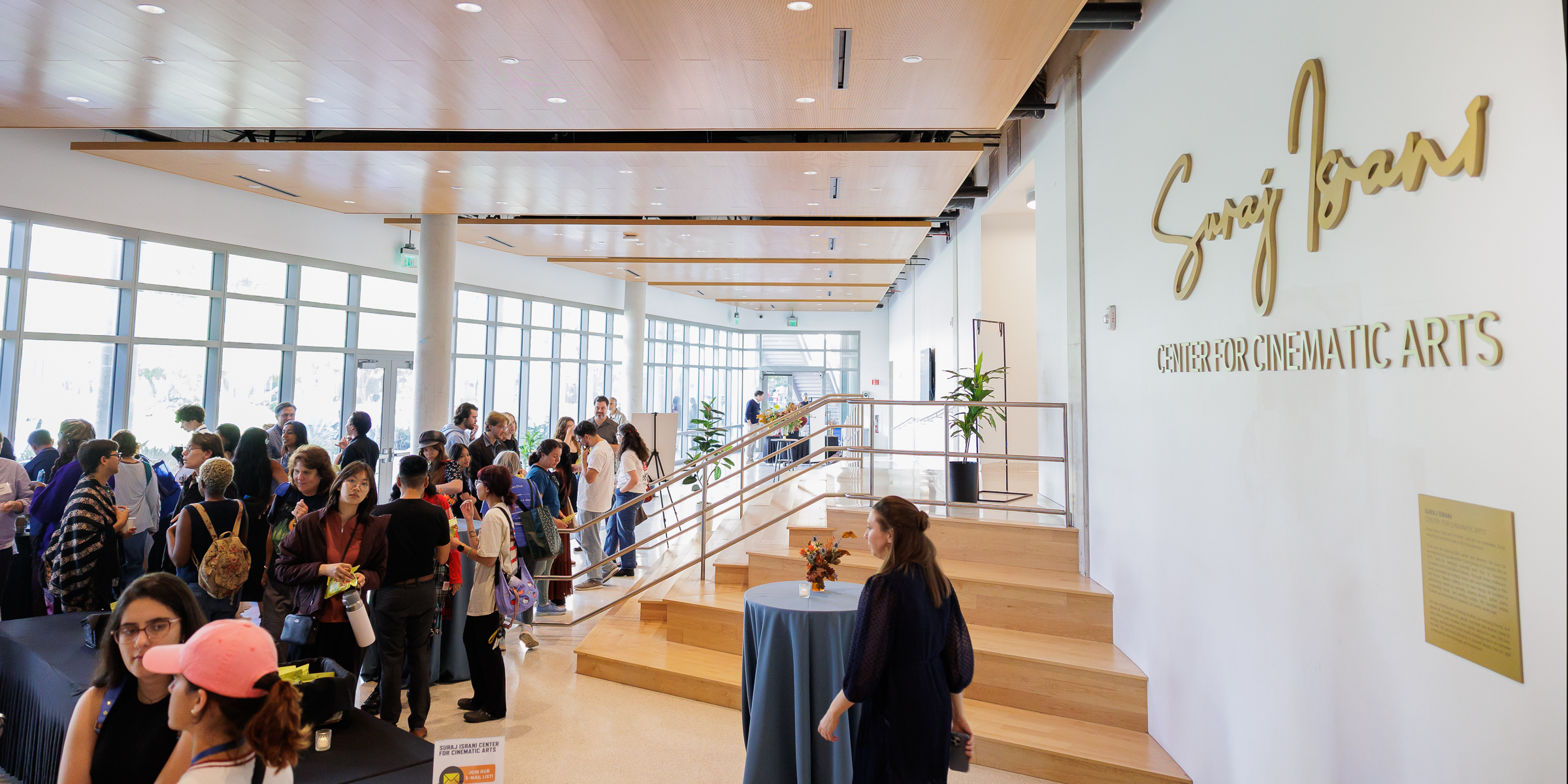 Participants gather in the reception area to connect and talk about the event.