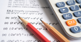 Physics mathematics exam with pencils and calculator