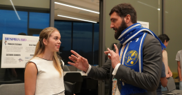 Horizon Strategic Advisor engages with campus community member. 