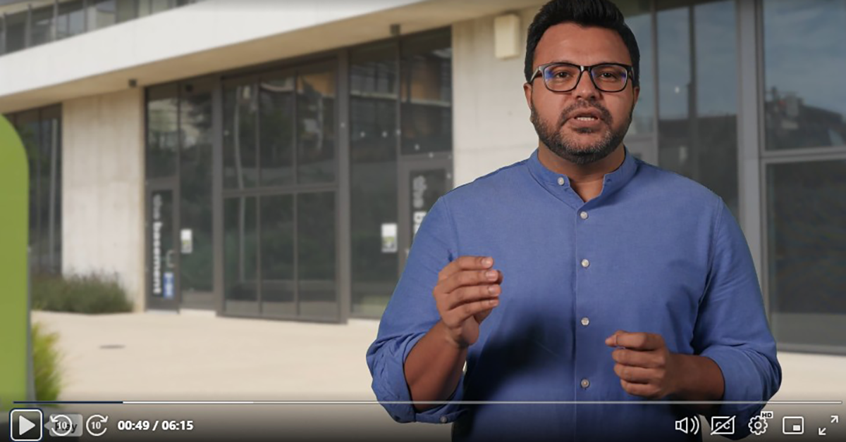 A video is paused on an image of a man, Trevor Bonjour, Assistant Teaching Professor in the Department of Computer Science and Engineering, who is speaking about Generative AI.