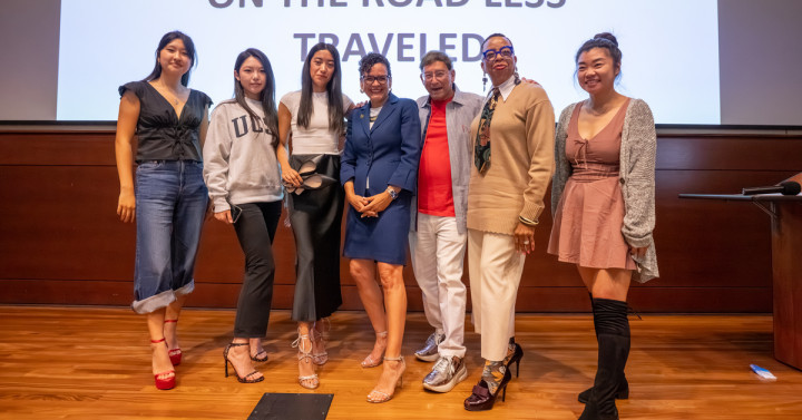 The iconic designer and entrepreneur Weitzman (pictured third from left) shared his story with Rady students last fall. Many in the audience donned pairs of his shoes at the event. Here they pose with Weitzman. 
