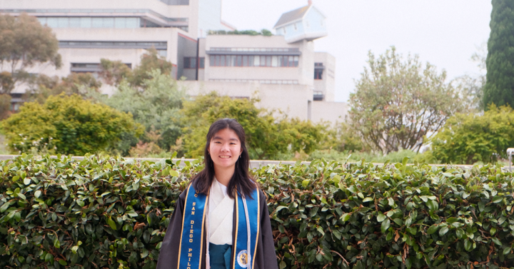 Portrait of Yao Yu in her graduation gown and sash